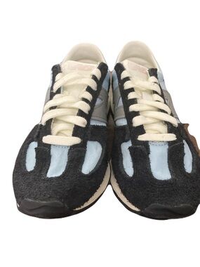 Women’s New Balance Black and Light Blue Suede Accent Sneakers
